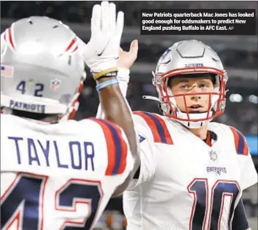  ?? AP ?? New Patriots quarterbac­k Mac Jones has looked good enough for oddsmakers to predict New England pushing Buffalo in AFC East.