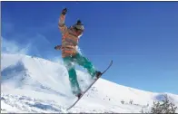  ??  ?? A skier on a slope at Jiangjunsh­an Ski Resort, which offers 18 trails of various degrees of difficulty.