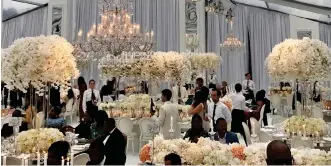  ??  ?? All white on the night: The fabulous floral displays at the reception