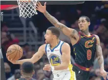  ??  ?? Golden State Warriors’ Stephen Curry (30) shoots a lay-up against Cleveland Cavaliers’ Jordan Clarkson (8) at Quicken Loans Arena. — USA Today Sports