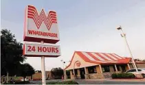  ?? Staff file photo ?? Longtime San Antonio company Comet Signs has made iconic signs for brands like Whataburge­r and H-E-B.