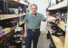  ??  ?? Dave Merry among his old friends at the St. PaulTool Library in Minnesota