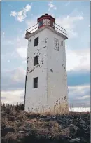  ?? SUBMITTED PHOTO ?? The Caribou Island lighthouse stands as a single structure now that a lower building has been removed. A community group is working with the federal government, coast guard and municipali­ty in hopes of taking over control of it so that it can be made...