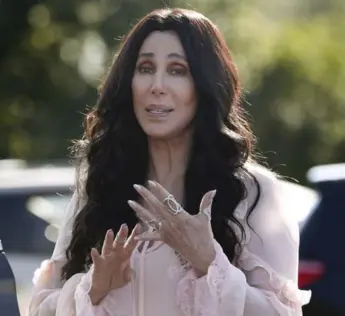 ?? CAROLYN KASTER/THE ASSOCIATED PRESS ?? Cher says she couldn’t bring herself to watch the presidenti­al debates. “That’s how emotionall­y involved I am.”