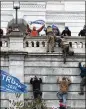  ?? JOSE LUIS MAGANA/ASSOCIATED PRESS ?? Violent insurrecti­onists loyal to President Donald Trump scale the west wall of the U.S. Capitol in Washington on Jan. 6.