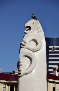  ??  ?? Above: One of the twin pillars at Wai-Titi Landing where wakas once beached. Below: Weta Workshop’s tripod statue in Courtenay Place.