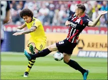  ??  ?? Dortmund’s Axel Witsel (left), and Frankfurt’s Dominik Kohr challenge for the ball during the Bundesliga soccer match between Eintracht Frankfurt and Borussia Dortmund in the Commerzban­k Arena in Frankfurt, Germany
on Sept 22. (AP)