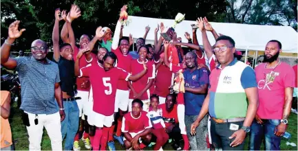  ?? KAVARLY ARNOLD ?? Members of Super Stars FC celebrate after winning the ConserveIT-sponsored Hanover Major League with a 2-1 victory over Esher FC at the Watson Taylor Park in Lucea, on Sunday.