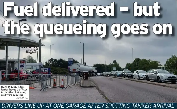  ?? ASHA PATEL ?? NEXT IN LINE: A fuel tanker leaves the Tesco in Hamilton, Leicester, as drivers queue up