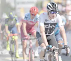  ?? — AFP photo ?? Great Britain’s Christophe­r Froome crosses the finish line of the second stage of the 105th edition of the Tour de France cycling race between Mouilleron-Saint-Germain and La Roche-sur-Yon, western France.