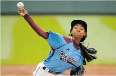  ?? GENE J. PUSKAR/THE ASSOCIATED PRESS ?? Pennsylvan­ia’s Mo’ne Davis, seen during the Little League World Series last year, has changed minds about a woman in the majors.