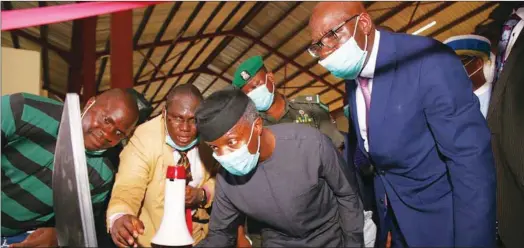  ??  ?? Vice-President Yemi Osinbajo (2nd right) and Edo State Governor, Mr. Gdowin Obaseki (right), during the groundbrea­king ceremony of the Benin Industrial Park (PIB), in Benin City, Edo State