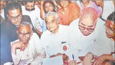  ?? HT FILE PHOTOS ?? ▪ (LR) Atal Bihari Vajpayee filing his nomination for Lucknow parliament­ary seat. (He represente­d it five times in the Lok Sabha), with Muslim clerics Maulana Kalbe Sadiq, Maulana Kalbe Jawwad and Maulana Hamidul Hasan, and with the then SP chief Mulayam Singh Yadav. The gentleman politician was well liked even by his political adversarie­s.