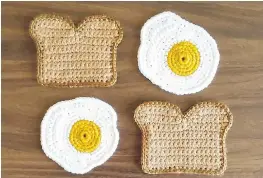  ?? PHOTOS: SURFACEWER­KS/ ETSY ?? Carly Dellger, a Wisconsin-based crocheter, specialize­s in creations that resemble such food items as eggs, avocados, toast and bacon.