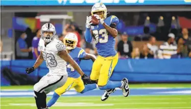  ?? KATELYN MULCAHY GETTY IMAGES ?? Derwin James’ intercepti­on clinched a victory for the Chargers over the Raiders on Monday night in Inglewood.