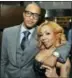  ??  ?? Clifford “TI” Harris, left, and his wife Tameka “Tiny” Harris.