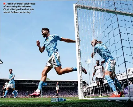  ?? ?? ■ Josko Gvardiol celebrates after scoring Manchester City’s third goal in their 4-0 win at Fulham yesterday