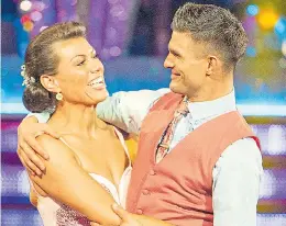  ??  ?? Kate Silverton leaves with partner Aljaz Skorjanec on TV last night