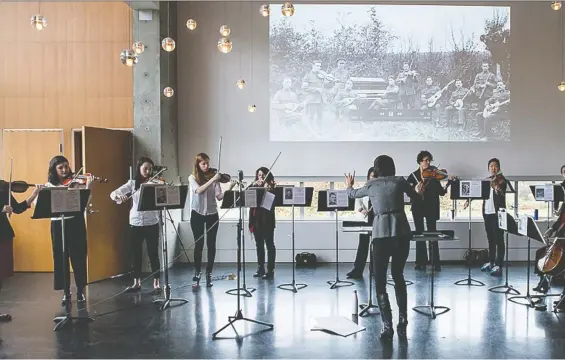  ??  ?? Janna Sailor and The Little Chamber Music ensemble mark significan­t historical anniversar­ies with free performanc­es such as this Remembranc­e Day show at Mountain View Cemetery.