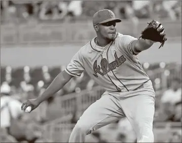  ?? Wilfredo Lee / The Associated Press ?? Atlanta Braves’ Julio Teheran delivers a pitch during the first inning of Saturday’s game against the Miami Marlins.