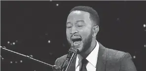  ?? WILLY SANJUAN/ INVISION/ AP ?? John Legend, performing at the Alliance for Children’s Rights’ dinner in Beverly Hills, Calif in March 2020, is returning to the road in 2021.