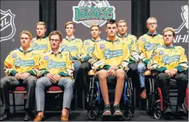  ?? AP PHOTO/JOHN LOCHER ?? Members of the Humboldt Broncos hockey team attend a news conference in Las Vegas on Tuesday. The Saskatchew­an junior hockey team’s bus was in a collision with a semi-trailer on a rural highway in April resulting in multiple fatalities and injuries.