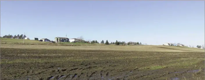  ??  ?? Arable soil, blue skies. The wide open spaces at Goulds, St. John’s west, await the changing of the seasons.