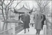  ?? BETTMANN / CORBIS ?? Richard Nixon (right), former US president, along with Zhou Enlai, former Chinese premier, strolls through Huagang Park on West Lake in Hangzhou on Feb 26, 1972. The Shanghai Communique was actually agreed upon in Hangzhou.