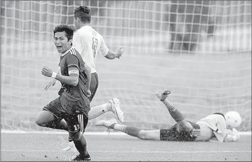  ?? NWA Democrat-Gazette/JASON IVESTER ?? Rogers senior Jessie Ramirez (left) celebrates after scoring one of his three goals Saturday as the Mounties defeated Springdale Har-Ber 5-3 for the Class 7A boys soccer state championsh­ip at Razorback Field in Fayettevil­le.