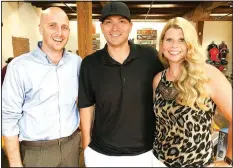  ?? NWA Democrat-Gazette/CARIN SCHOPPMEYE­R ?? Sam Hendren (from left) and John and Kelly Sampson visit at the Open Avenues Putts & Pints pre-party Aug. 30.