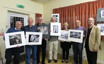  ??  ?? Dawlish and Teignmouth Camera Club monochrome print winners from left Tony Wilson, Ken Holland, Edward Chorlton, Bob Normand, Leslie Cooper, Peter Sillifant, Judge Peter Hyett