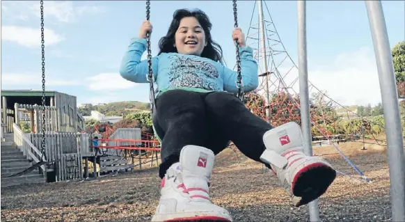  ?? Photo: ANDREA O’NEIL ?? Playing fair: Titahi Bay girl Latisha Freemantle, 7, has made a video arguing for a disabled swing at Aotea Lagoon.