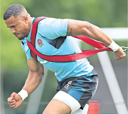  ?? ?? Getting ready: Anthony Watson trains with England last month and has now signed a short-term contract with the RFU