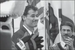  ?? KARL MONDON/BAY AREA NEWS GROUP ?? Longtime Sharks hockey player Patrick Marleau is recognized by San Jose Mayor Matt Mahan with a city proclamati­on on Thursday in the city hall rotunda. Marleau, who played 23 years for the team, is having his No. 12 jersey retired this weekend.