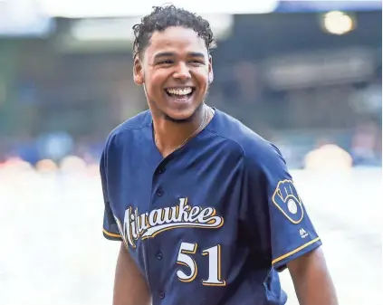  ?? BENNY SIEU / USA TODAY SPORTS ?? Brewers right-hander Freddy Peralta made his major-league debut May 13. The 22-year-old is 6-4 with a 4.02 earned run average and 86 strikeouts in 13 starts.