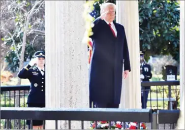  ?? NICHOLAS KAMM/AFP ?? US President Donald Trump salutes after laying a wreath at the tomb of former president Andrew Jackson after he took a tour of Andrew Jackson’s Hermitage in Nashville, Tennessee, on March 15.