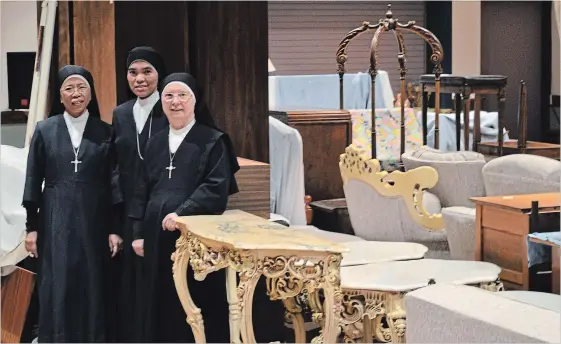  ?? JOE BARKOVICH
SPECIAL TO THE WELLAND TRIBUNE ?? Sisters Marian Limen, from left, Juliet Villaceran and Margherita Ianni stand with some of the donated furniture that will be used to furnish their new convent in Summerside, P.E.I.