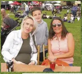  ??  ?? Visitors Kerri Cord with her son Jamie and friend Shelley Gaffney, from the Kettledrum Bar, Dundee, whose regulars supported the Coupar Angus Gala Day