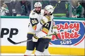  ?? GARETH PATTERSON / AP ?? Vegas Golden Knights center William Karlsson (71) celebrates with right wing Michael Amadio (22) after Karlsson’s goal during the third period of Game 6 against the Dallas Stars on Monday in Dallas.