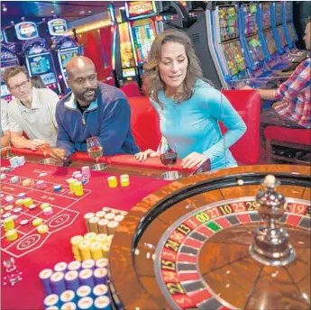  ?? Carnival Cruises ?? PLAYER’S CLUB members can get free drinks — or even comped trips for certain high rollers.