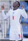  ??  ?? ED MAN Nketiah celebrates after scoring England’s third