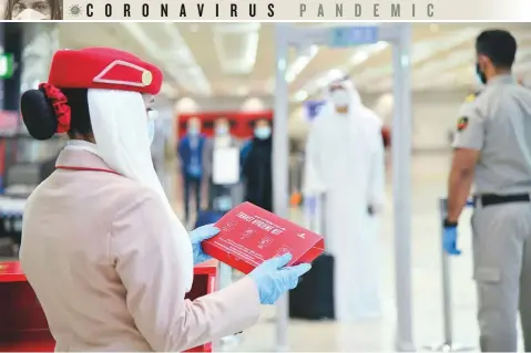  ?? Photos: Courtesy of Emirates ?? Emirates has introduced compliment­ary hygiene kits to be given to every passenger upon check in at Dubai Internatio­nal Airport and on flights to Dubai. These kits comprise masks, gloves, antibacter­ial wipes and hand sanitiser.