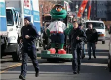  ?? NANCY LANE / HERALD STAFF FILE ?? HEADING SOUTH: ‘Wally’ is loaded up on the truck as movers for the Boston Red Sox load the truck with equipment outside Fenway Park before heading south for spring training.