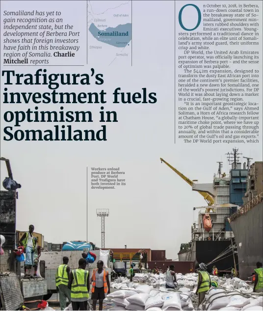  ??  ?? Workers unload produce at Berbera Port. DP World and Trafigura have both invested in its developmen­t.