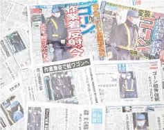  ??  ?? This photo illustrati­on shows Japanese daily newspapers with front page coverage of the release of Ghosn. — AFP photo