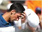  ?? GEOFF BURKE-USA TODAY SPORTS ?? LUNGLAI: Reaksi Novak Djokovic setelah tersingkir dari ajang Miami Open kemarin.