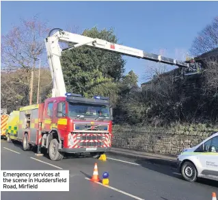  ??  ?? Emergency services at the scene in Huddersfie­ld Road, Mirfield