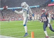  ?? Matt Stone, Boston Herald file ?? Indianapol­is Colts tight end Eric Ebron, left, being defended by Jason McCourty of the New England Patriots last season, is one of many NFL players who are unhappy with the new collective bargaining agreement that passed Sunday in a close vote.