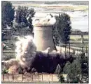  ?? AP ?? A cooling tower is demolished in 2008 at Yongbyon, North Korea. North Korea said Saturday it will hold a “ceremony” for the dismantlin­g of its nuclear test site on May 23-25.