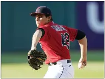  ?? TONY DEJAK — THE ASSOCIATED PRESS ?? Indians starter Eli Morgan delivers to the Tigers in the first inning.